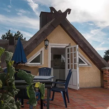 Ferienhaus Im Reetdachhaus *